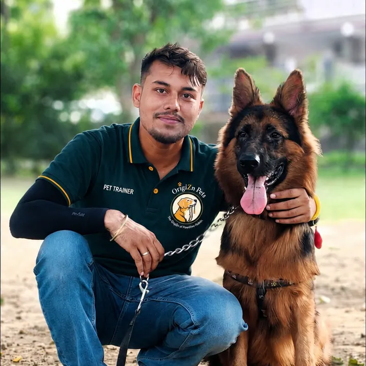 Pratap Kaushik, OrigiZnPets dog trainer, with a German Shepherd