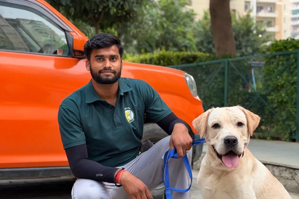 Young Labrador during a puppy training session with an OrigiZnPets trainer